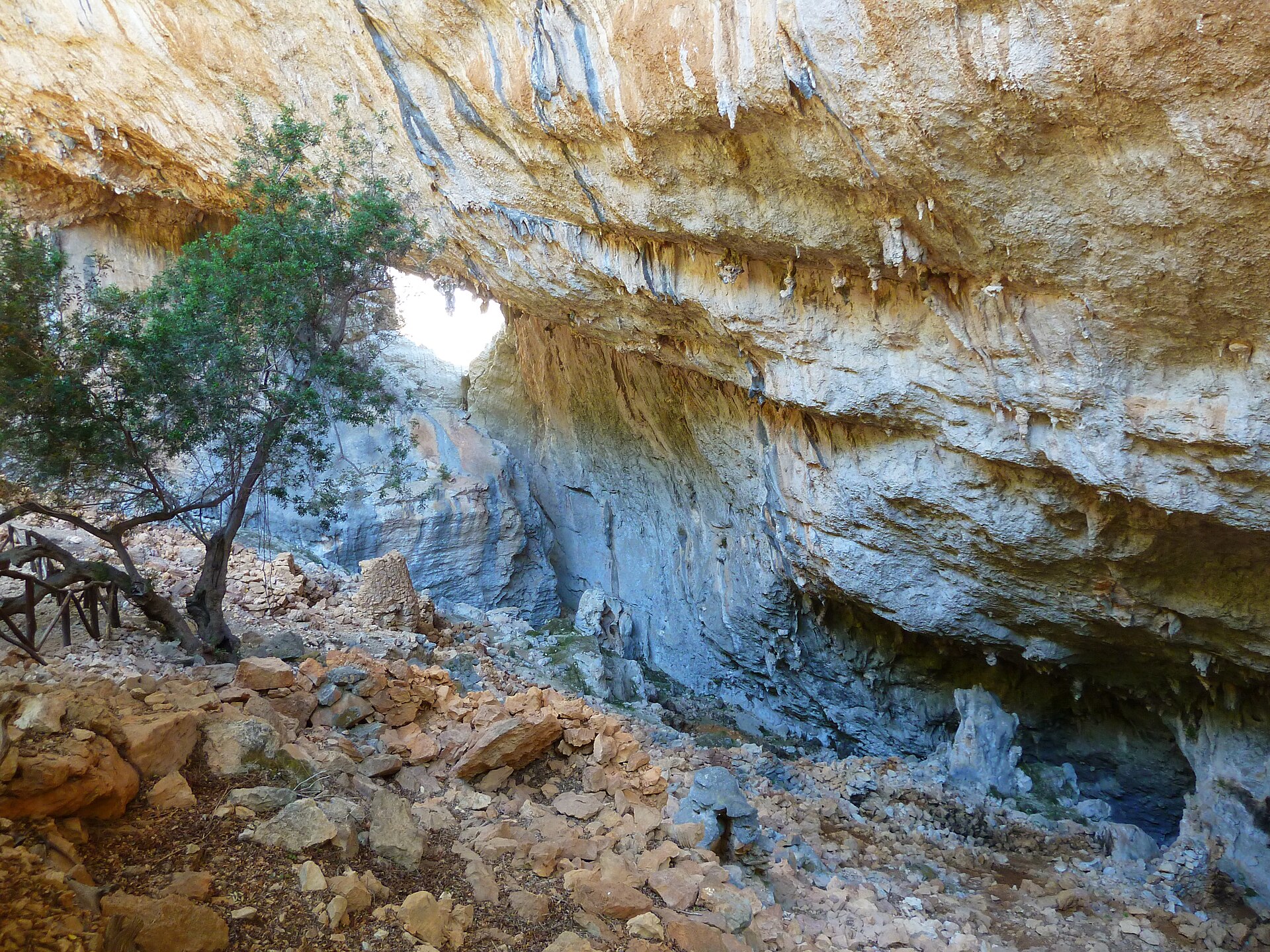 The Nuragic village of Tiscali, hidden inside a karst sinkhole.