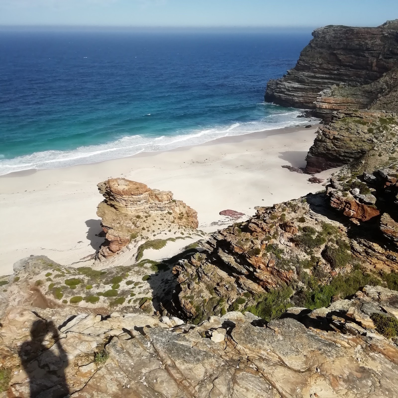 Diaz Beach white sand cove framed by cliffs at Cape Point, Cape of Good Hope