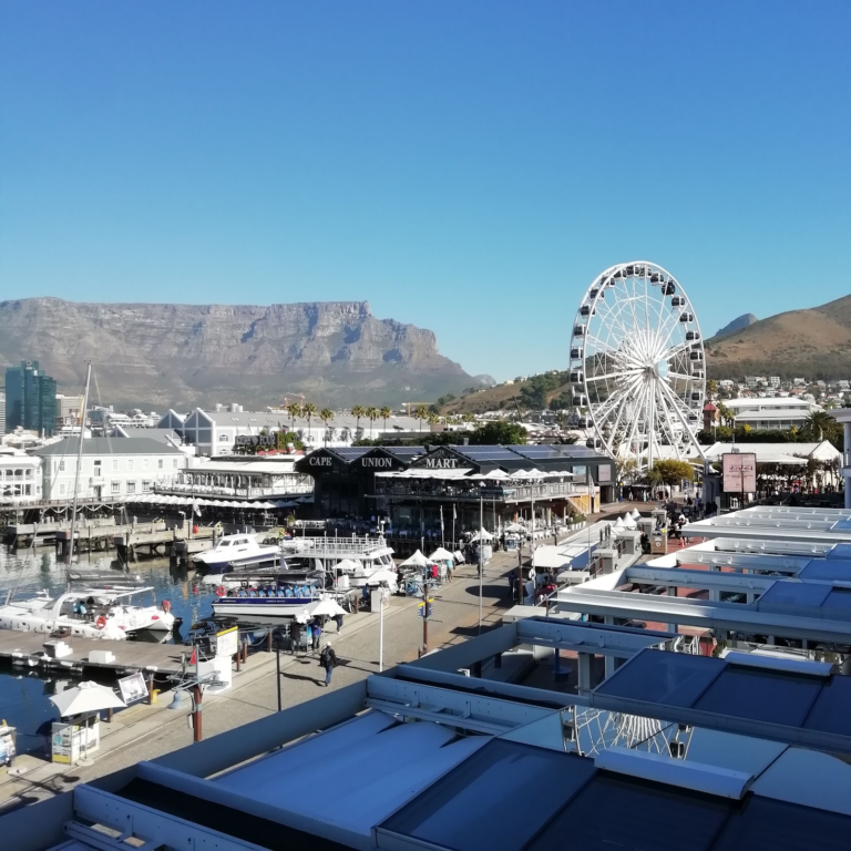 Table Mountain and the Cape Wheel seen over the V&A Waterfront marina, Cape Town